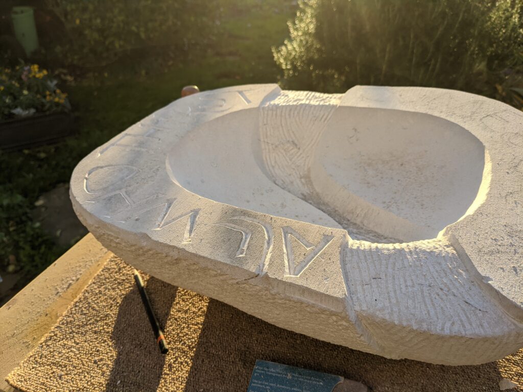 Stone bowl, inscription in progress