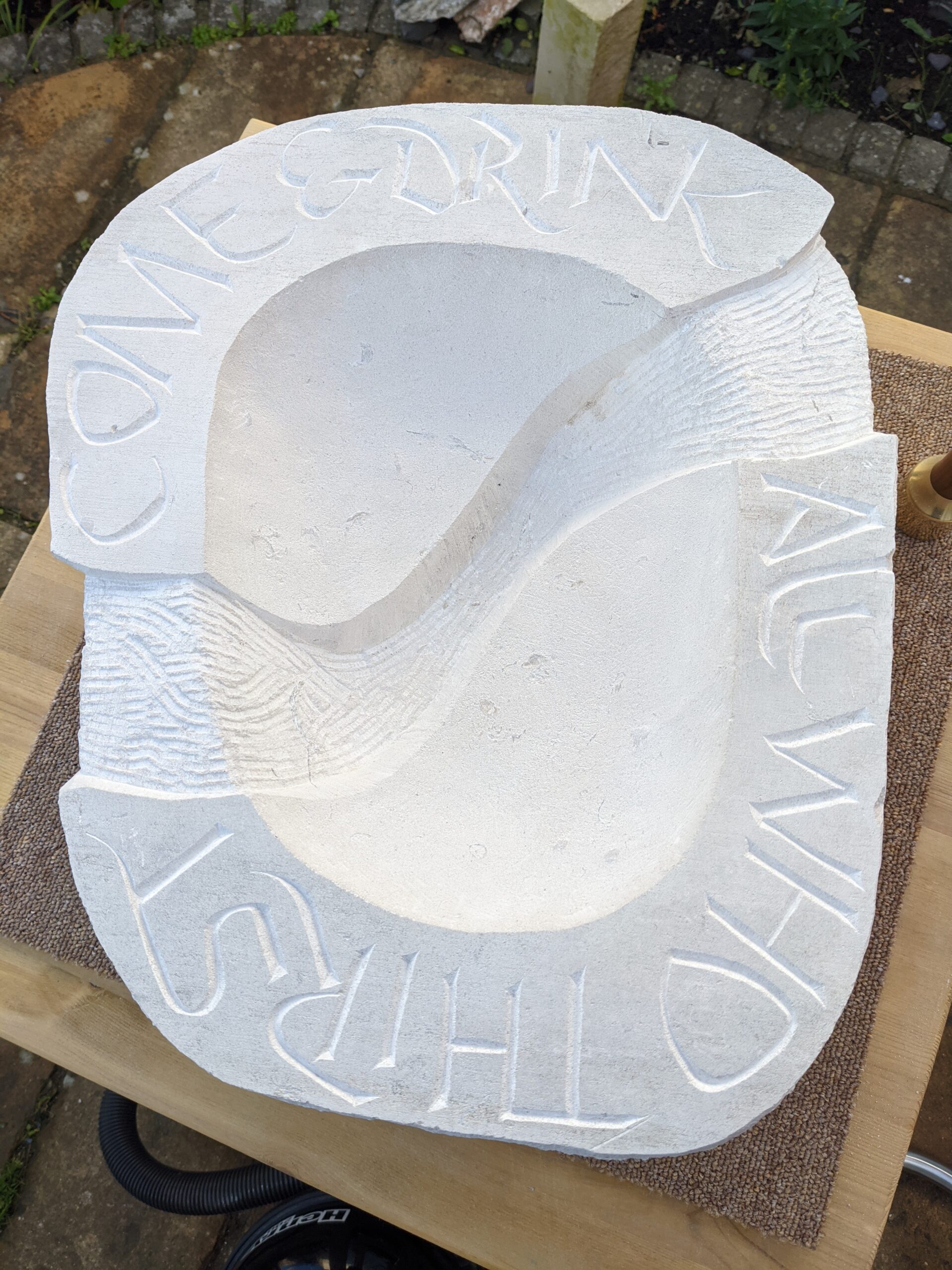 Completed stone bowl with inscription